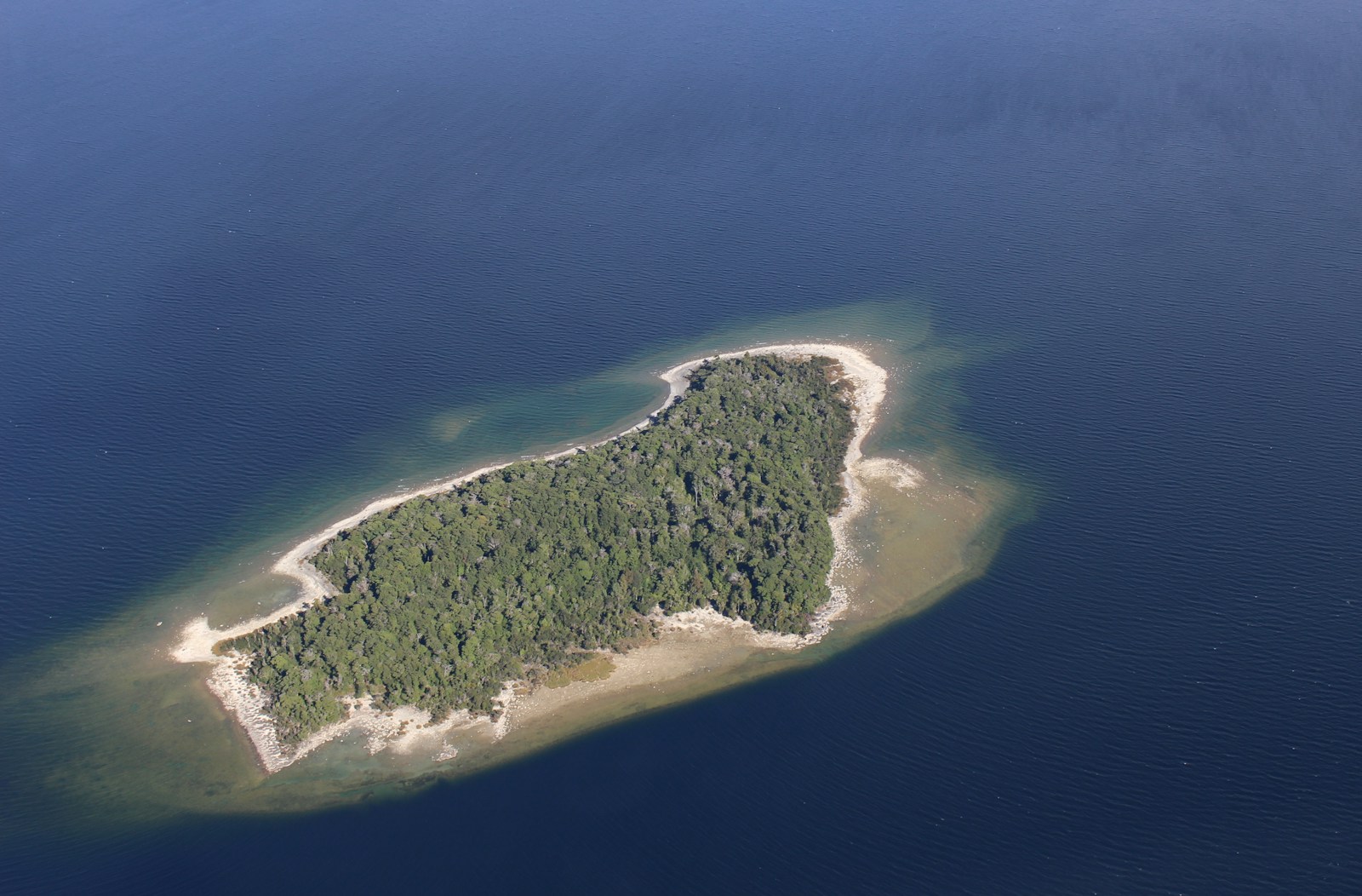 a small island in the middle of a body of water
